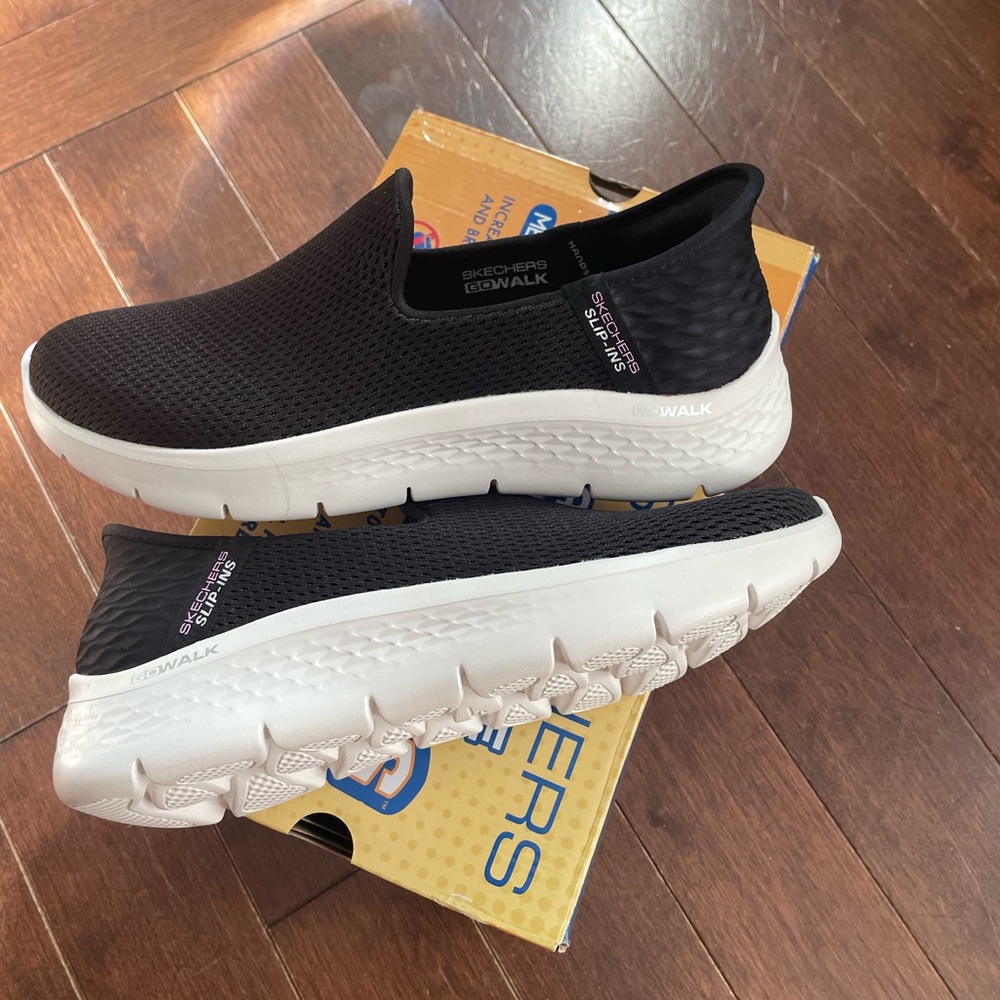 Skechers Black and White Go Walk Slip-Ons